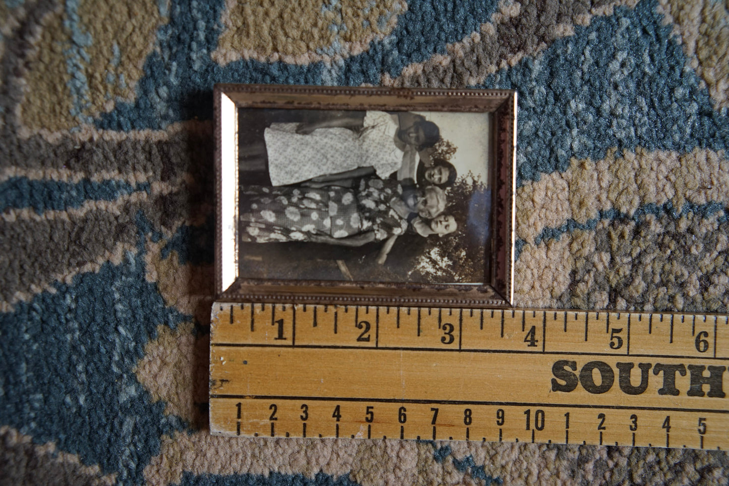 small antique photograph of four lovely ladies in vintage brass frame