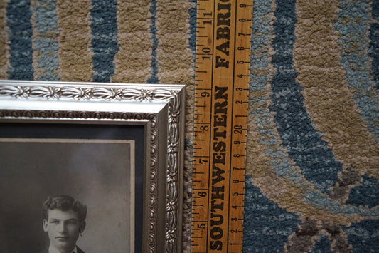 antique portrait photo in ornate frame